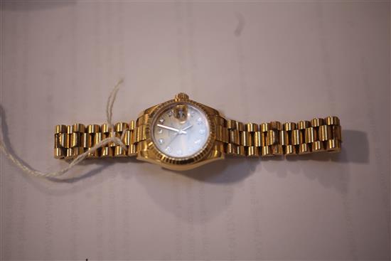 A ladys modern 18ct gold and diamond set Rolex Oyster Perpetual Datejust wrist watch,